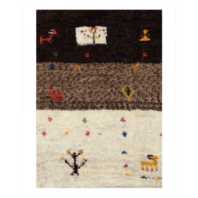 The word “Gabbeh” literally translates to “in the rough,” and it is an accurate description of this style of Persian rug....