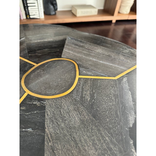 Sculptural Modern Organic Black Wood Sune Small Coffee Table or Side Table by Made Goods with Golden Brass Line Inlay...