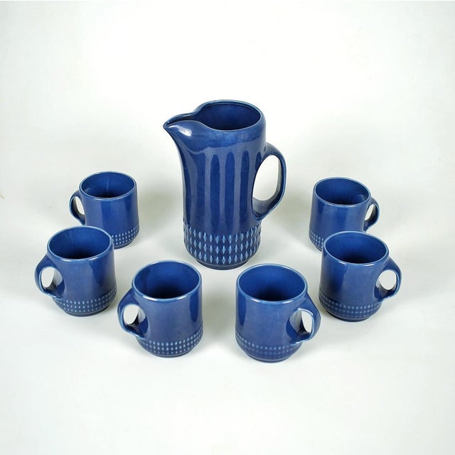 A set of a pitcher and six cups made of cobalt blue glazed ceramic by Vitrosan, 1970s. Excellent condition, only one of...