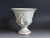 A beautifully modeled antique German porcelain urn or cachepot in the Neoclassical taste, dating to around 1900. The piece...