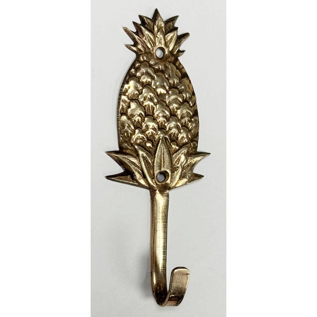 Vintage detailed brass pineapple wall hook. Marked 'Made In India'. Patina to brass.