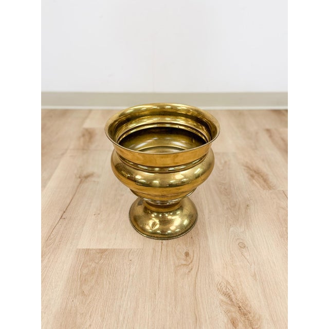 This gorgeous large vintage brass planter is a warm and versatile decorative find that works across a wide range of...