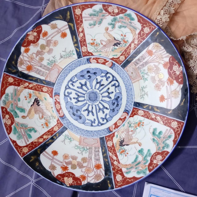 Up for sale is a stunning and exceptionally large 20-inch (approx. 50 cm) Antique Japanese Imari Porcelain Charger, dating...