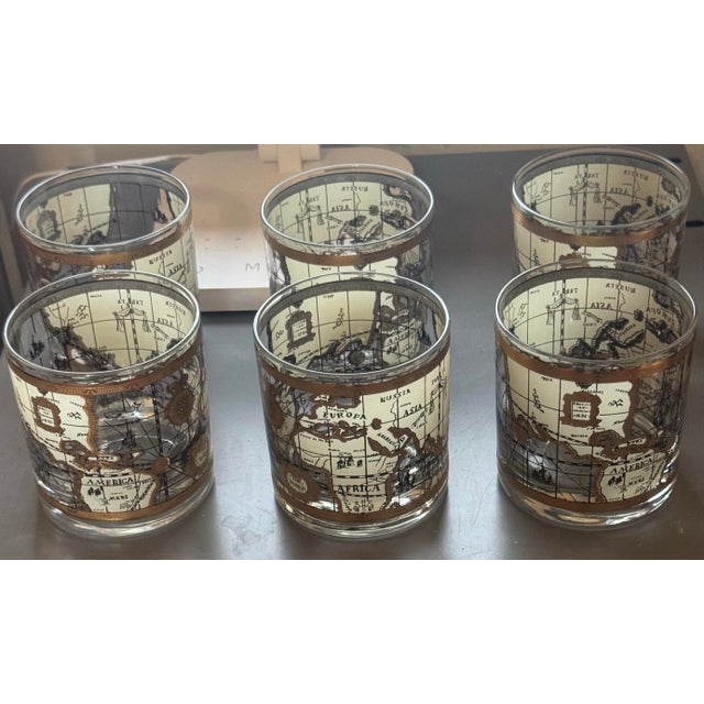 Hard-to-find vintage set of six 3.5-inch lowball / old fashioned rocks glasses featuring the iconic "Old World Map"...