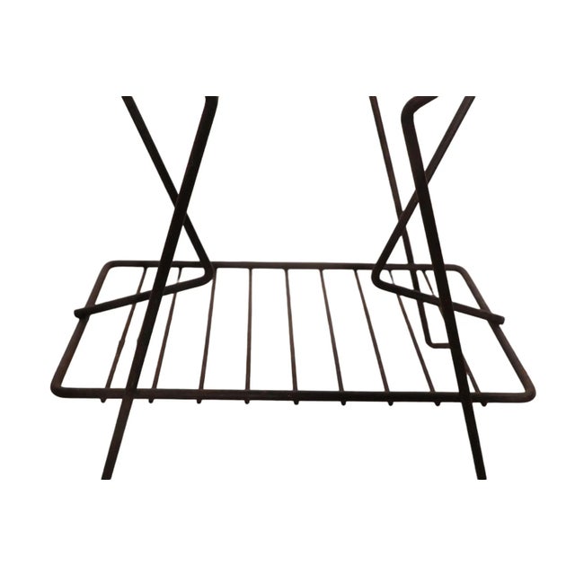 Classic Mid Century wire magazine stand by Richard Galef, constructed of welded angular wrought iron rods. Architectural...