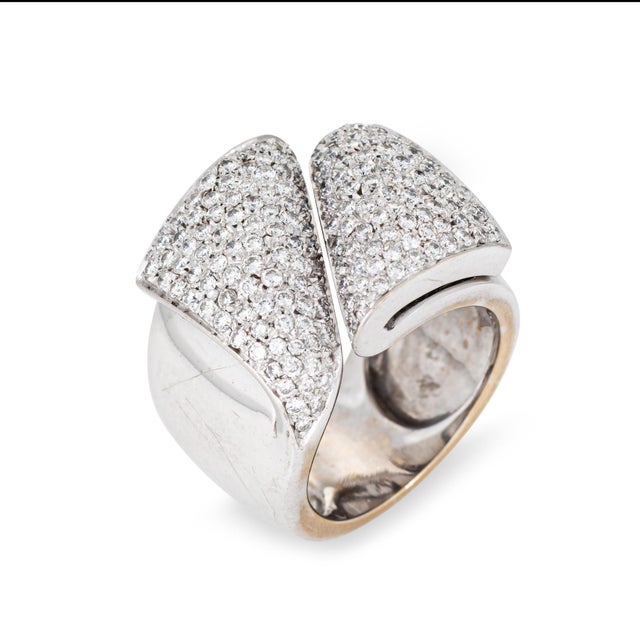 Stylish contemporary Portuguese pave diamond cigar ring crafted in 18k white gold. Pave set with an estimated 1.75 carats...