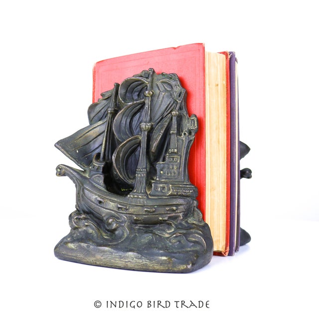 Antique Pair of Armor Bronze Invincible Armada 1588 Ship Bookends, c. 1920 This wonderful pair of bookends resembles the...