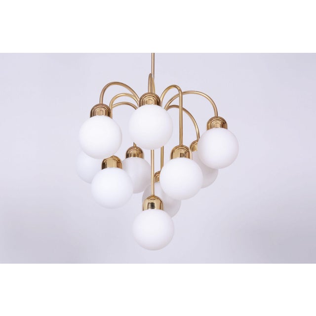 This ten-arm chandelier is an elegant representative of 1950s czechoslovak design, produced in the renowned glassworks of...
