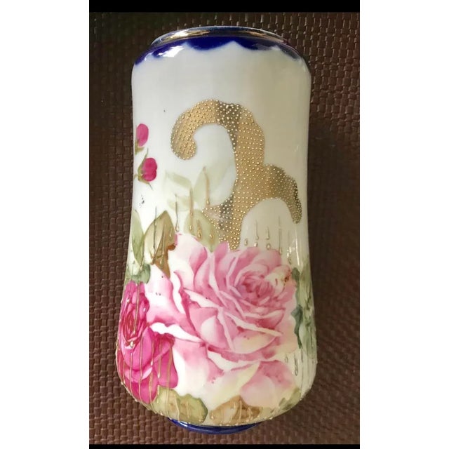 Stunning gold relief vintage hand painted vase with floral design and cobalt blue accents. Marked “Hand Painted in Japan”...