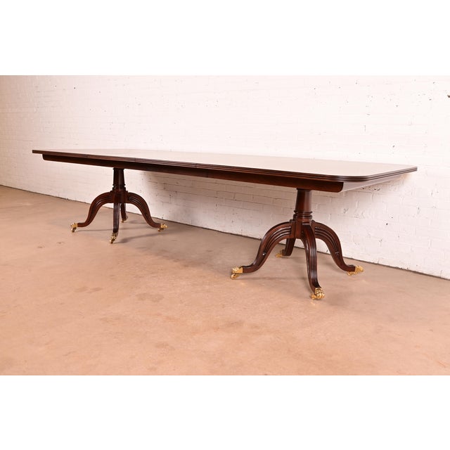An exceptional Georgian or Regency style "Duke" double pedestal extension dining table By Ralph Lauren USA, Circa Late...