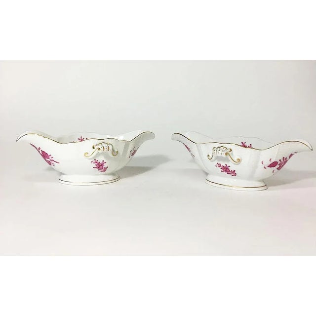 Herend Hungary porcelain "Chinese Bouquet Raspberry" gravy boats Two shell handled gravy boats #226/AP Measurements: 8 cm...