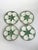 Elegant set of four French oyster plates in glazed ceramic, featuring six shell-shaped wells surrounding a central sauce...