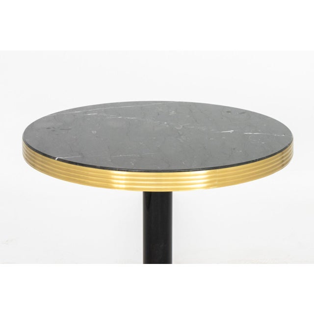 Art Deco Style Nero Marquina Marble Top Side Table, the circular top with brass rim on tripod base. 29" H x 27.5"...