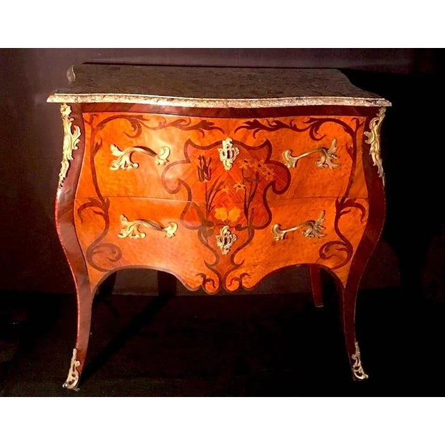 Elegant Louis XV French 18th century Commode with 'Lumachella' marble-top above two drawers decorated sans travers and...