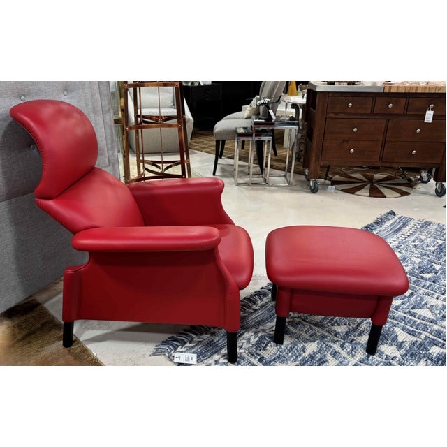 Italian Modern Poltrona Frau Sanluca Lounge Chair & Ottoman. Features modern lines with striking red leather upholstery...