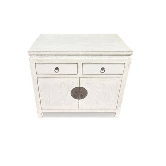 White Shanghai Cabinet is made out of Elm wood. It has 2 drawers, 2 doors and 1 removable shelf. it can be use a side...