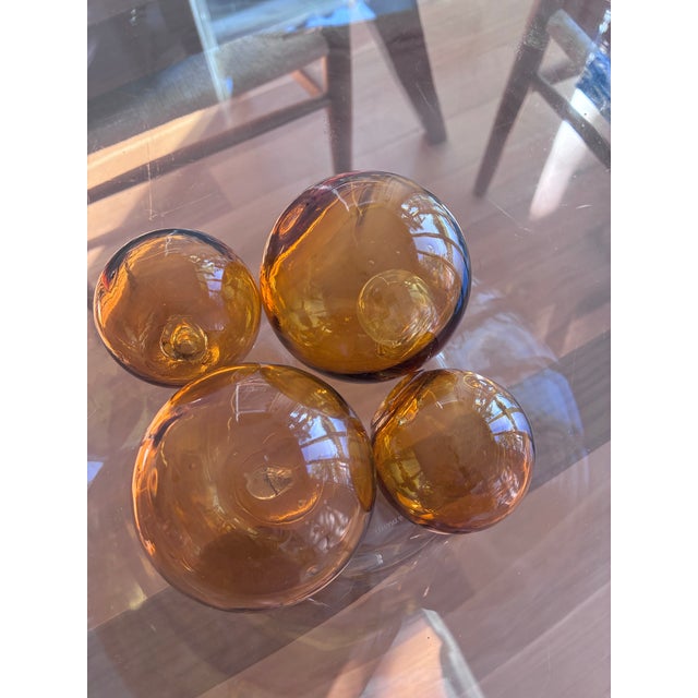Beautiful golden amber colored floats, two 3” and two 2” reflect light wonderfully and add a whimsical touch. These were...