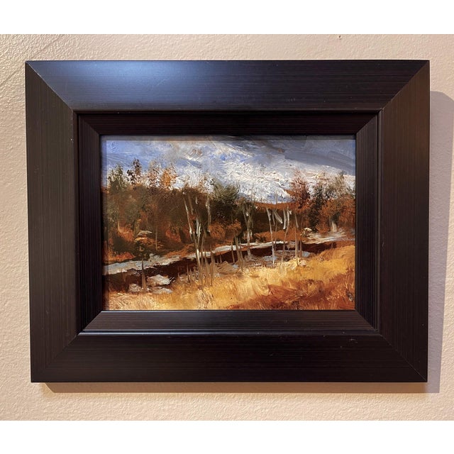 This oil painting captures the serene landscape of the Platte River in Denver during December, showcasing a blend of...