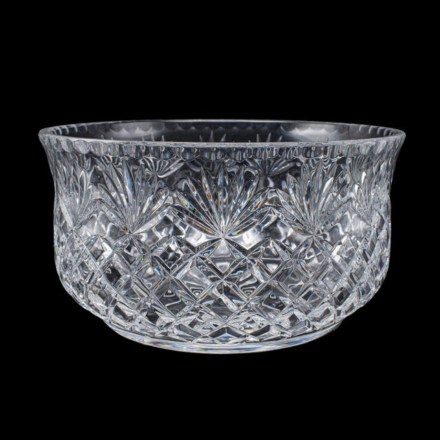 This is a large vintage punch bowl. An English, crystal glass serving or fruit dish, dating to the mid 20th century, circa...