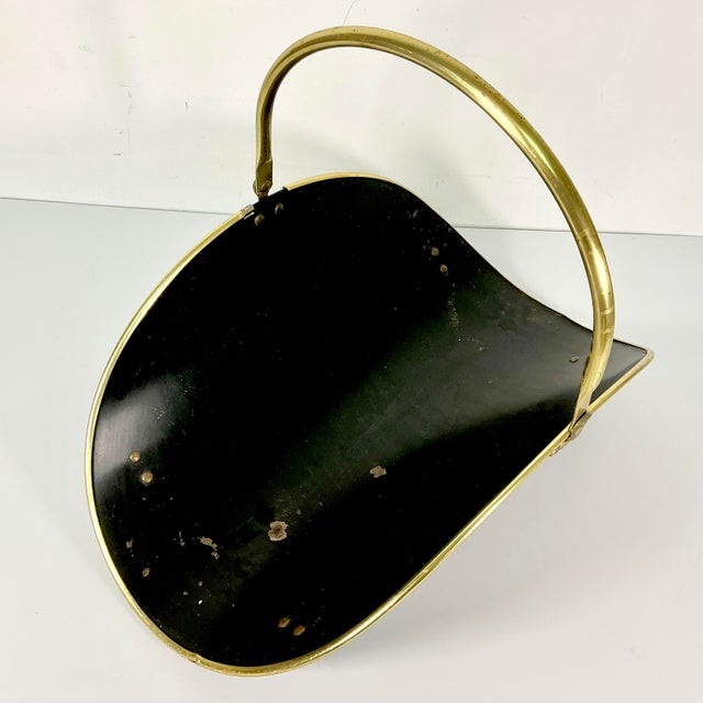 This is a large Firewood Holder from the Mid-Century. It’s the traditional Americana Federal Arts and Crafts curved holder...