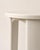 Minimalist stool with a round seat and thick legs. Modern and clean design, ideal as an end table, side table, or...