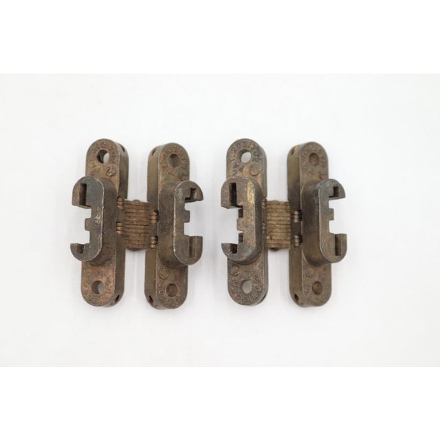 Pair of invisible concealed cabinet door hinges made of brass. Made in USA. They are in good working order. The original...