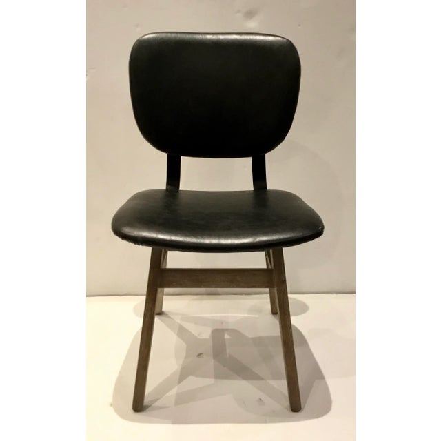 Stylish Industrial Modern Black Faux Leather Side Chair/Desk Chair, cerused finished light wood base, metal accents,...