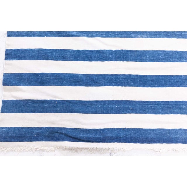 Vintage Indian Dhurrie Striped Rug Size: 12'5" × 15'7" (378 × 474 cm) This striking vintage Indian Dhurrie rug showcases a...