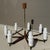 Elegant Scandinavian Modern chandelier from the 1960s featuring a refined combination of teak wood, black lacquered metal,...