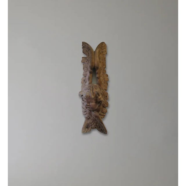 Ornately-Carved Walnut Carving of an Angel. France, circa 1700s. Possibly from a ship or country estate.