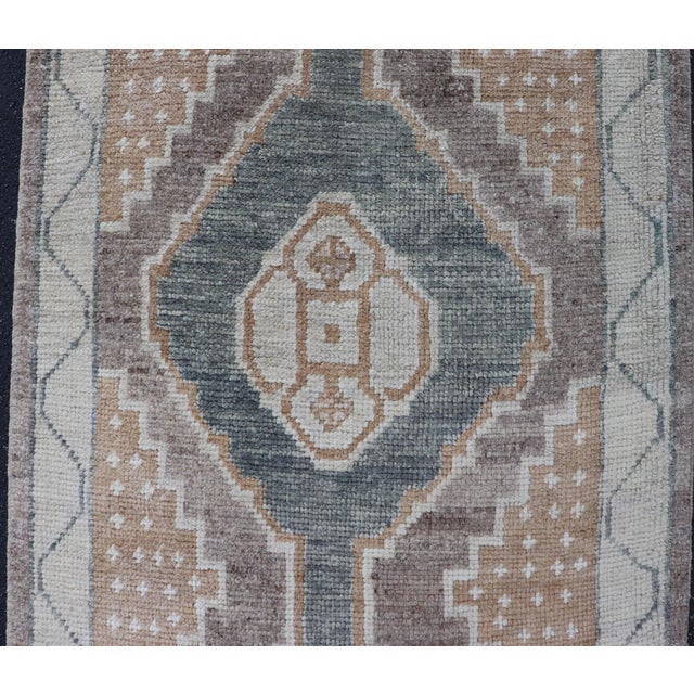 Early 21st Century Long Turkish Oushak Runner With Soft Green Field and Beige Medallions For Sale - Image 5 of 16