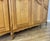 Gold Vintage French Louis XVI Oak Four Door Carved Armoire For Sale - Image 8 of 12