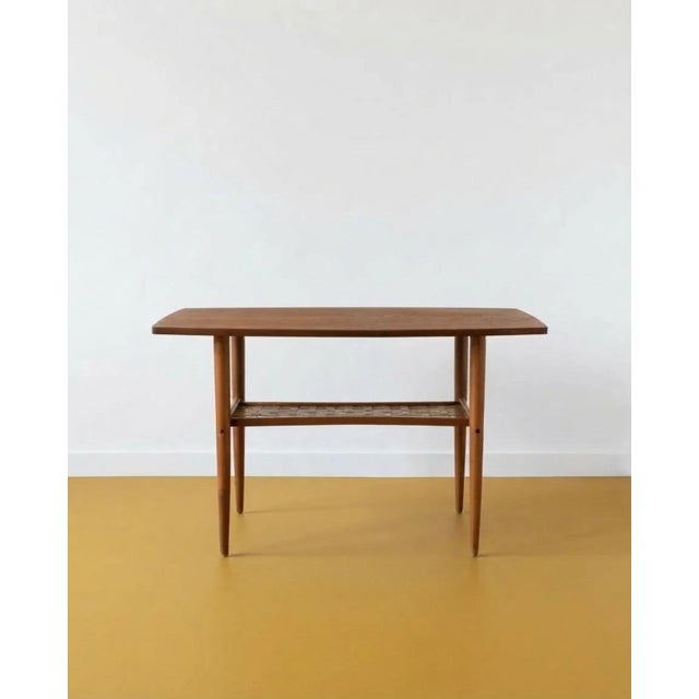 Vintage 1950s Swedish teak and beech coffee table, W. 92 D. 53 H. 57 cm. Dimensions: Width: 92 cm Depth: 53 cm Height: 57...