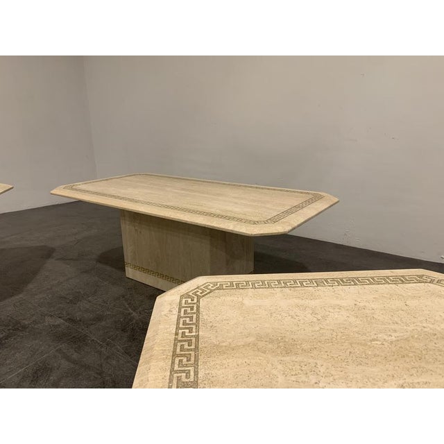 Set of exquisite travertine coffee table and side tables. Finely finished table tops with inlaid stone Greek key...