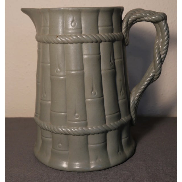 Up for sale is a Mid 19th Century English Victorian Staffordshire Pale Green Drabware Bamboo/Rope Relief Motif Pitcher! It...