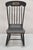 Antique Colonial Stencil Back Black Painted Plank Bottom Rocker Rocking Chair. Circa late 19th Century. Measurements: 40"...