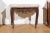 A French Régence period walnut console table from the early 18th century, with its original marble top. Born in France...