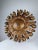 Spectacular completely original mid-century ceiling lamp in the shape of a sun with leaves and 12 flowers that are both...