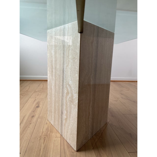 Gorgeous Italian travertine diamond base, glass top table, in great condition! The travertine base with warm hues and...