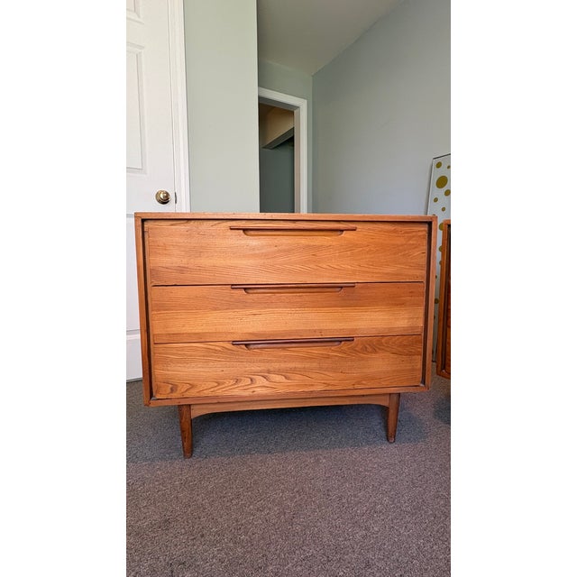 Dillingham Samara dressers designed by Merton L. Gershun. Wisconsin elm cases accented with walnut biscuit joints and...