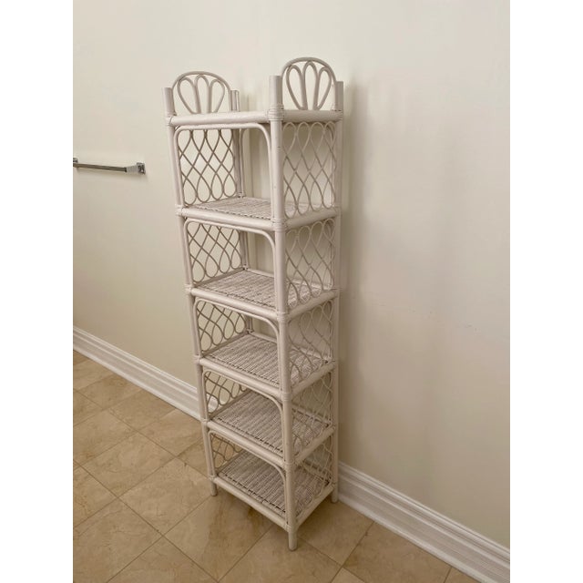 Tall and exquisitely Boho Chic. Six standard shelves and endless possibilities for storage. No makers mark as this was...