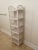 Tall and exquisitely Boho Chic. Six standard shelves and endless possibilities for storage. No makers mark as this was...