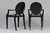 Elegant kartell louis ghost armchairs, designed by philippe starck. Made of black, translucent plastic, these chairs bring...