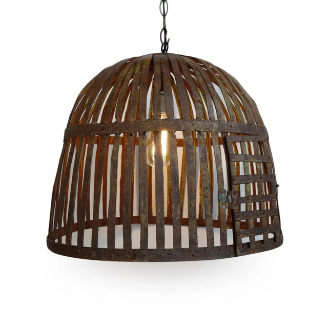 Original vintage iron basket cage, repurposed into unique industrial farm style lighting fixture. Beautiful aged and...