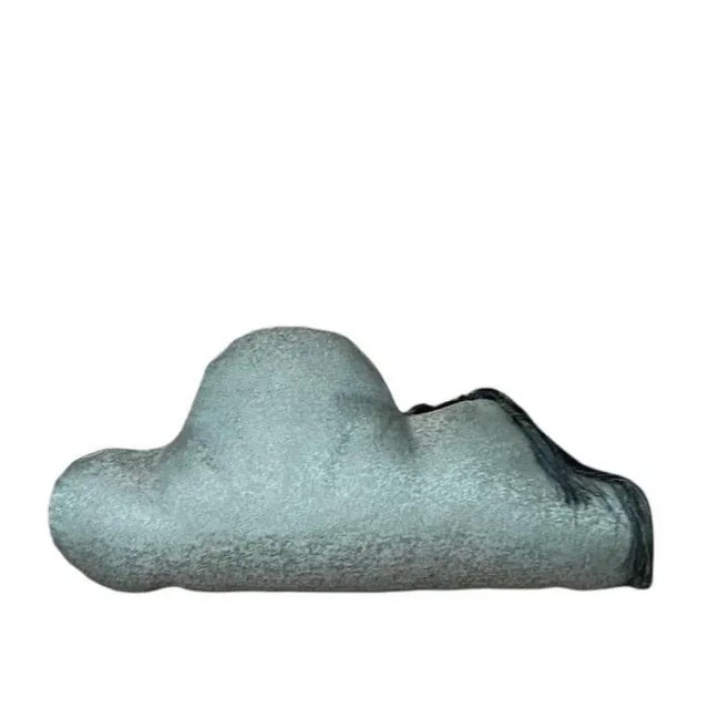 Odd-shaped pillow mend to be a focal point. Made with a silk blend jacquard from Dedar featuring a small floral pattern....