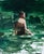 Swimmer Study 2 by Jon Doran | Oil on panel of a figure swimming in green water For Sale