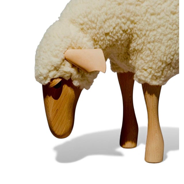 Equal parts iconic and adorable large life-size grazing sheep sculpture or stool in the style of Lalanne. This sheep...
