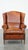 This comfortable sheep leather wing chair with a warm color scheme and a beautiful patina. This fantastic sheep leather...