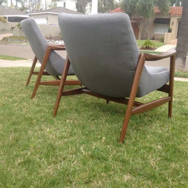 Mid-Century Modern lounge chairs in the style of lb Kofod-Larsen. Stunning design; Mid-century style at its finest! Frames...