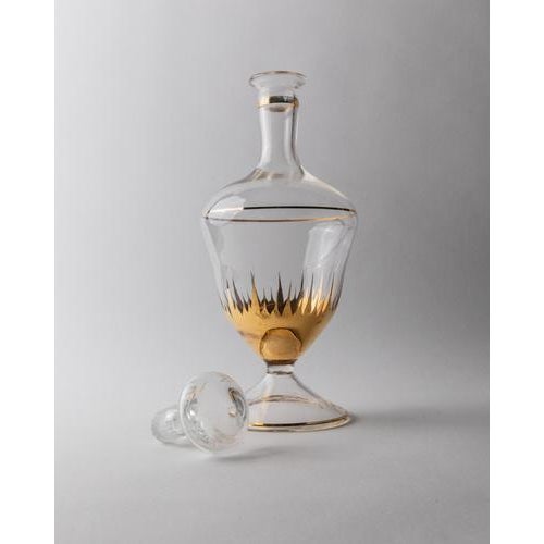 This vintage Murano glass carafe from the 1960s is a refined example of Italian art glass, crafted in clear crystal with...